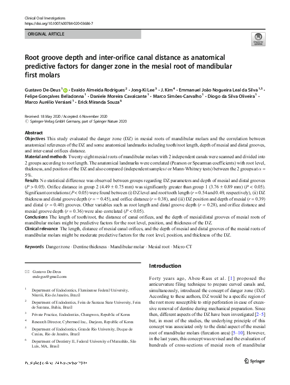 (PDF) Root groove depth and inter-orifice canal distance as anatomical ...